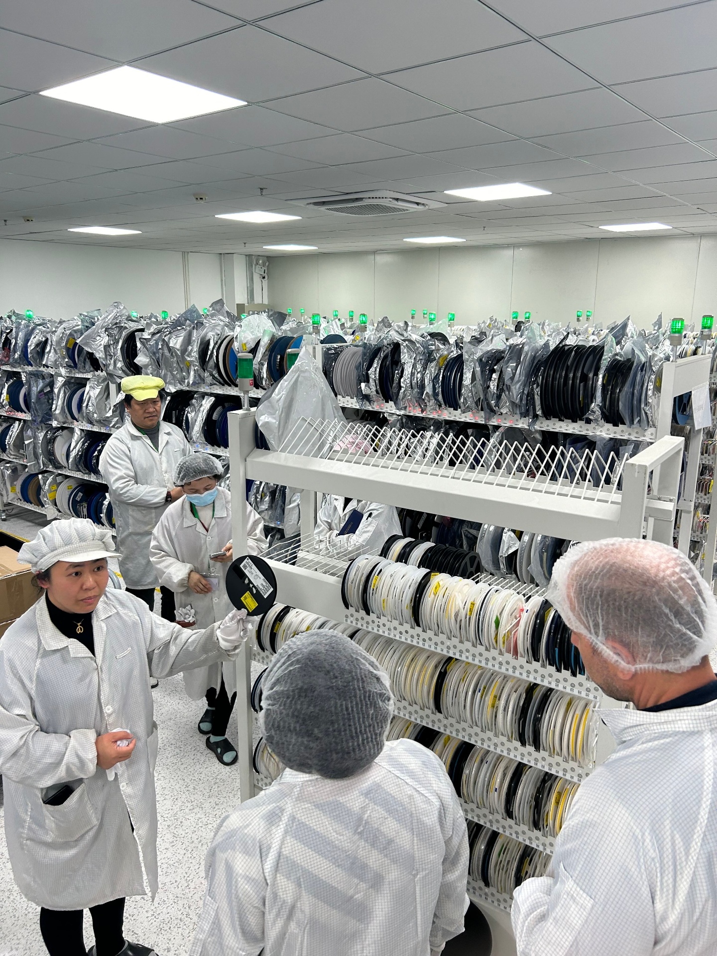 Component reel storage room being inspected during a supplier validation visit