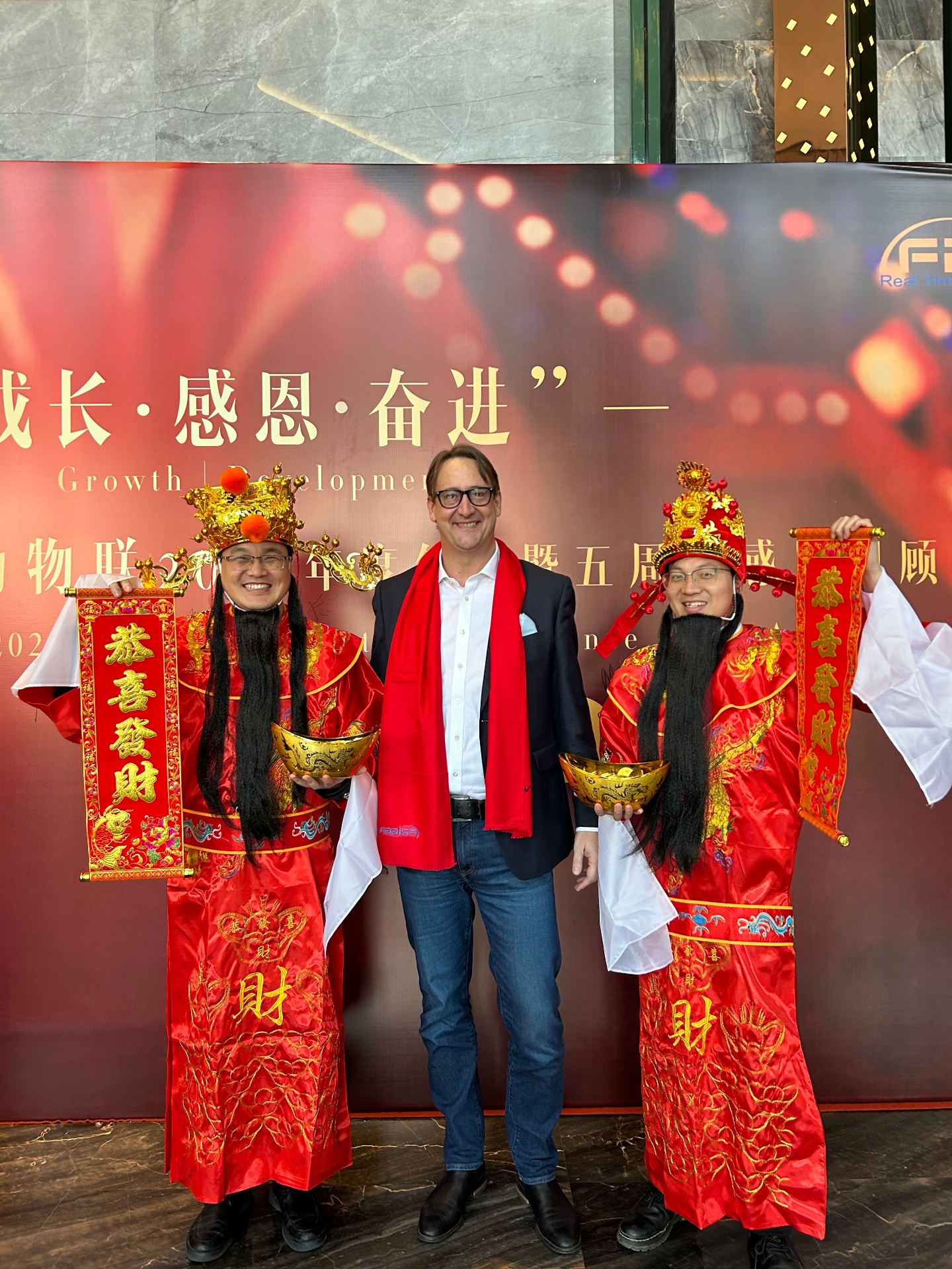 Matthew Holland at an IoT manufacturer's five-year anniversary event in China